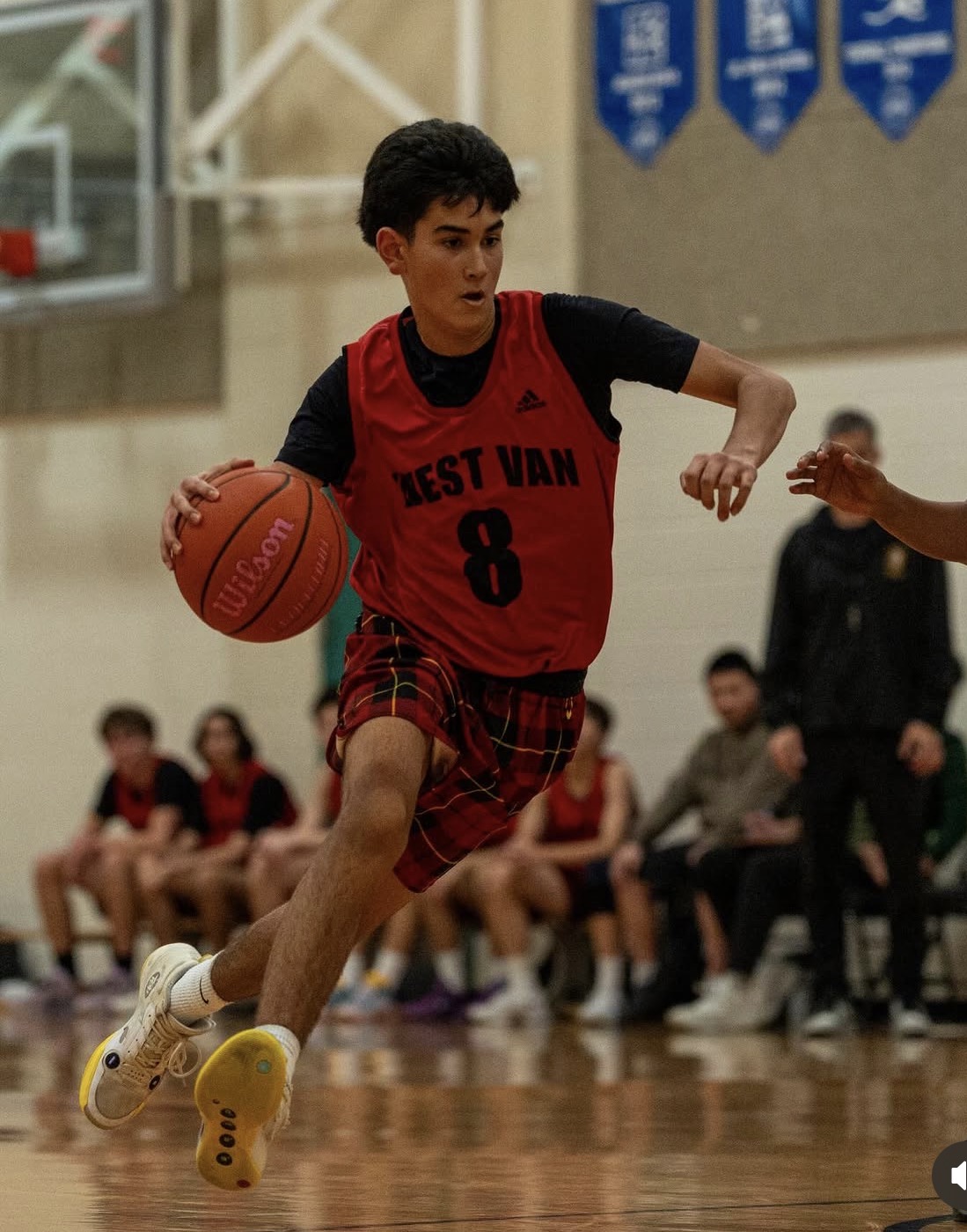 West Van basketball player driving to the hoop